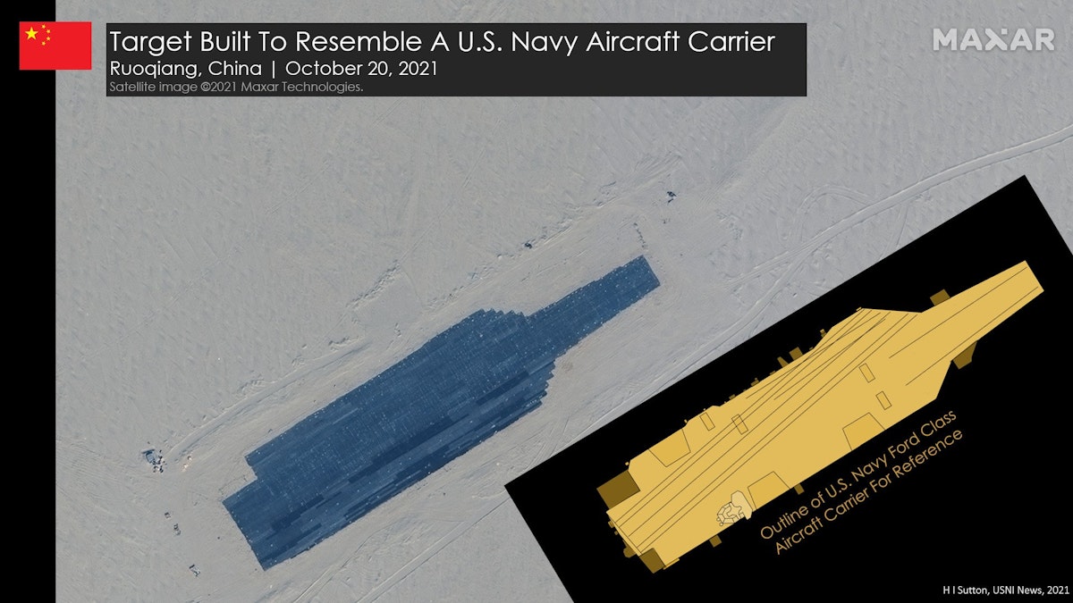 صورة لهدف على شكل حاملة طائرات أميركية في صحراء تاكلامكان وسط الصين في 20 أكتوبر 2021. - news.usni.org
